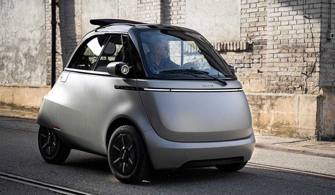 Cover Image for Nachhaltigkeit: Microlino wiegt mit Fahrer & Gepäck weniger als Akku eines E-SUV